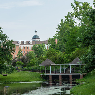 Shot of Bobcat Depot over a pond with a gazebo in sight.