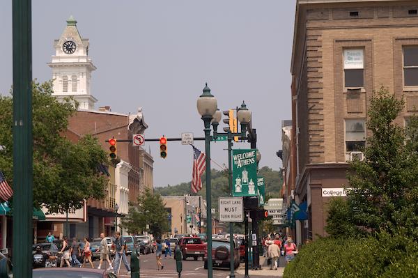 People crossing the street on court street